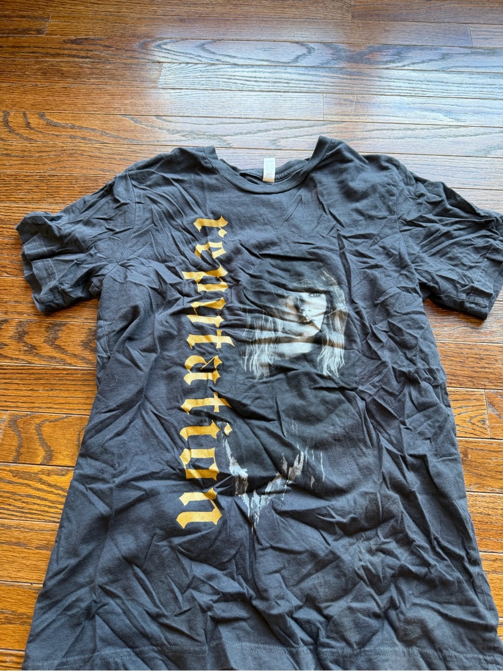 Taylor Swift Black Tee with Gold Vertical Script and Portrait